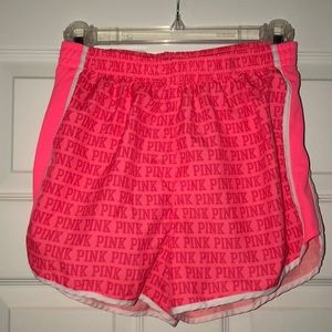 Neon pink Victoria’s Secret PINK gym shorts
